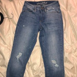 medium wash ripped skinny jeans